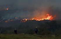 A fire rages on the slopes of Table Mountain, in Cape Town South Africa