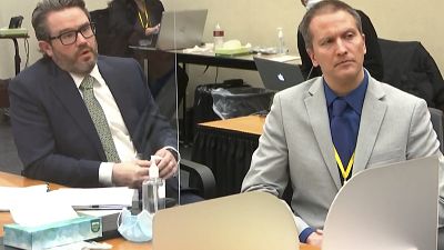 In this image from video, defense attorney Eric Nelson, left, and defendant, former Minneapolis police officer Derek Chauvin,