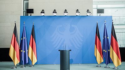 The lectern of German Chancellor Angela Merkel is pictured before a statement