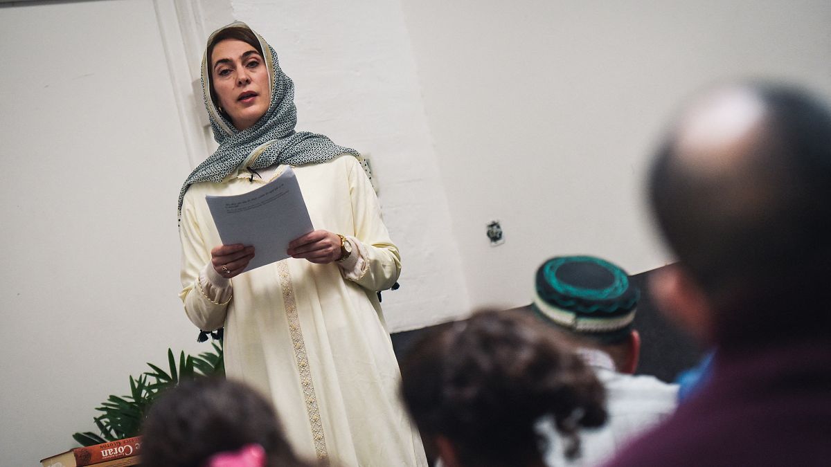 France's first female imam Kahina Bahloul leads a friday prayer in a rented venue of the 11th arrondissement of Paris on February 21, 2020. 