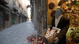 Via San Gregorio Armeno, famous for its statuettes, is empty, in downtown Naples, southern Italy, Wednesday, March 11, 2020. 