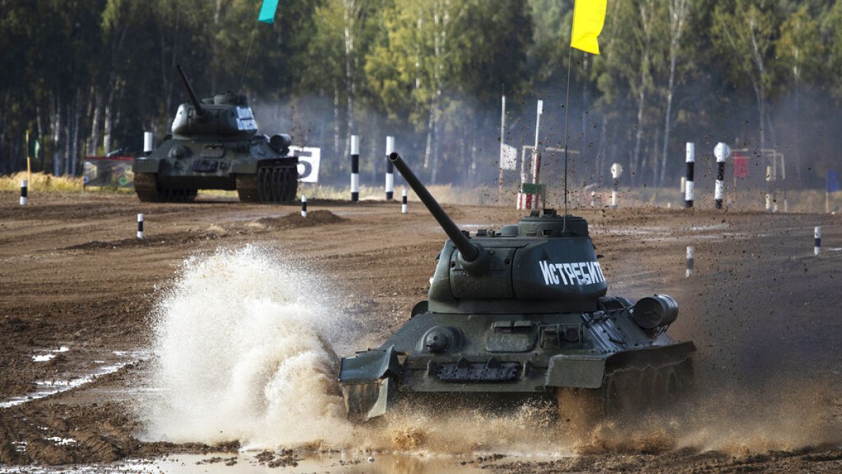 Soviet tanks T-34 perform during the International Military Technical Forum Army-2020 in Alabino, outside Moscow, Russia, Sunday, Aug. 23, 2020.