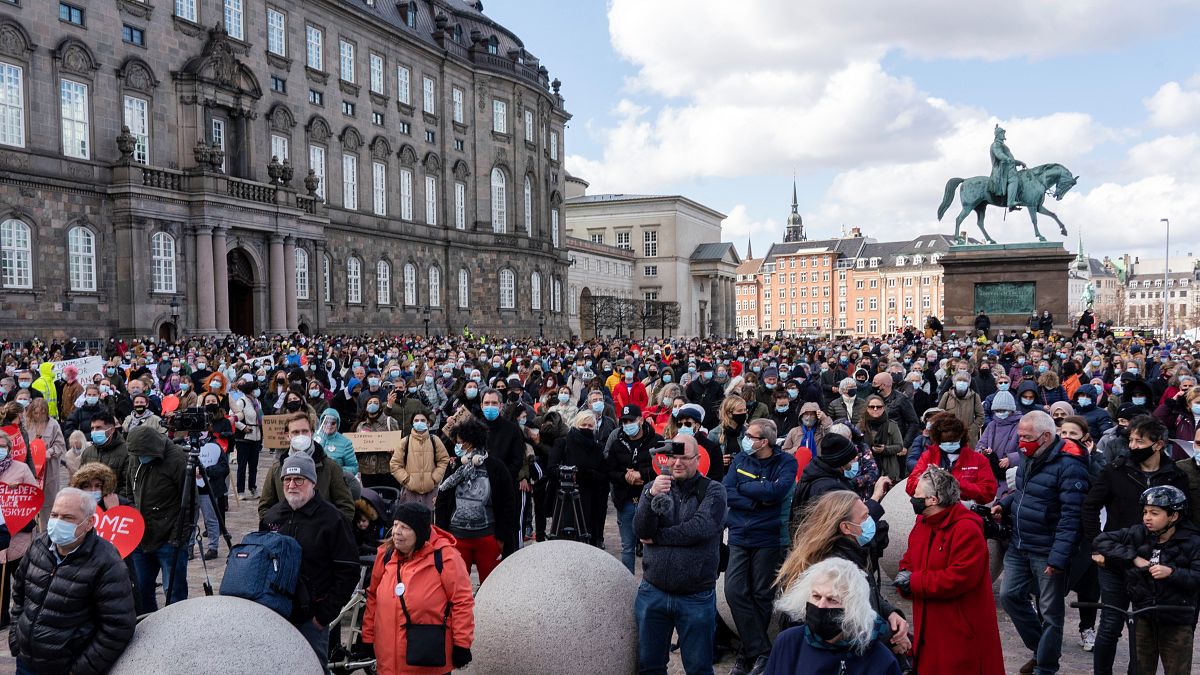 People attend a demonstration against the tightening of Denmark’s migration policy in Copenhagen on Wednesday
