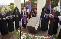 Religious leaders sing at a ceremony at the Montebello Armenian Genocide Monument in Montebello, Calif., Saturday, April 24, 2