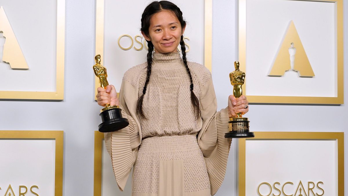 Chloe Zhao, winner of the awards for best picture and director for "Nomadland," poses in the press room at the Oscars on April 25, 2021, in Los Angeles.