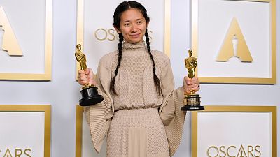 Chloe Zhao, winner of the awards for best picture and director for "Nomadland," poses in the press room at the Oscars on April 25, 2021, in Los Angeles. Chloe Zhao, winner of the awards for best picture and director for "Nomadland," poses in the press room at the Oscars on April 25, 2021, in Los Angeles.