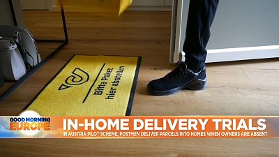Mat left by front door for home delivery trial in Austria.