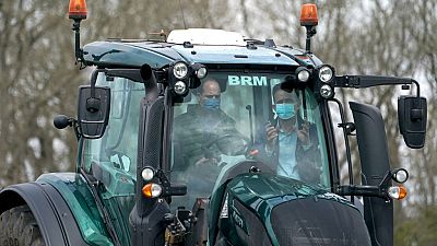 Prince William driving a tractor