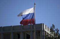 The Russian flag flies over the Russian Embassy in Helsinki
