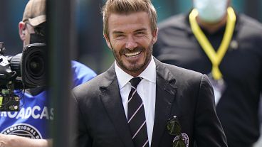 avid Beckham,  walks on the field as he greets fans before an MLS soccer match between Inter Miami, and LA Galaxy, Sun
