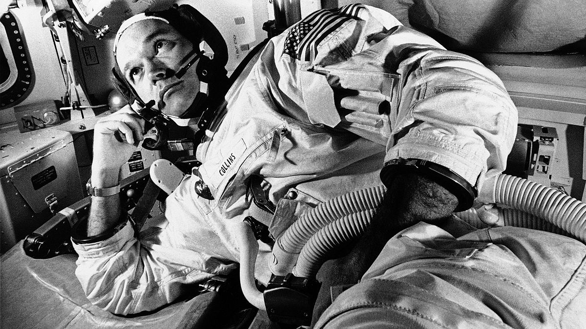  In this June 19, 1969 file photo, Apollo 11 command module pilot astronaut Michael Collins takes a break during training for the moon mission, in Cape Kennedy, Fla.