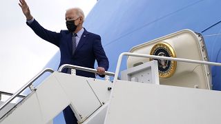 President Joe Biden waves at Dobbins Air Reserve Base, Ga., as he boards Air Force One to return to Washington, Thursday, April 29, 2021.