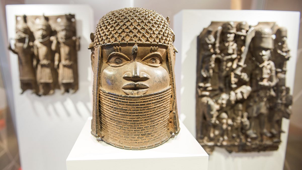 Three pieces of Benin Bronzes are displayed at Museum for Art and Crafts in Hamburg, Germany, Wednesday, Feb. 14, 2018. 