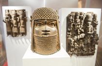 Three pieces of Benin Bronzes are displayed at Museum for Art and Crafts in Hamburg, Germany, Wednesday, Feb. 14, 2018.