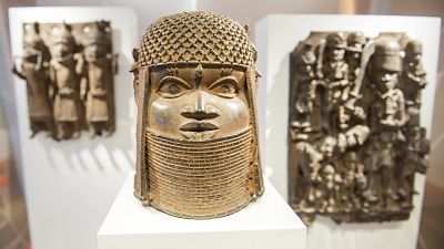 Three pieces of Benin Bronzes are displayed at Museum for Art and Crafts in Hamburg, Germany, Wednesday, Feb. 14, 2018