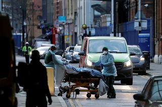 A patient outside the Royal London Hospital in east London earlier this year.