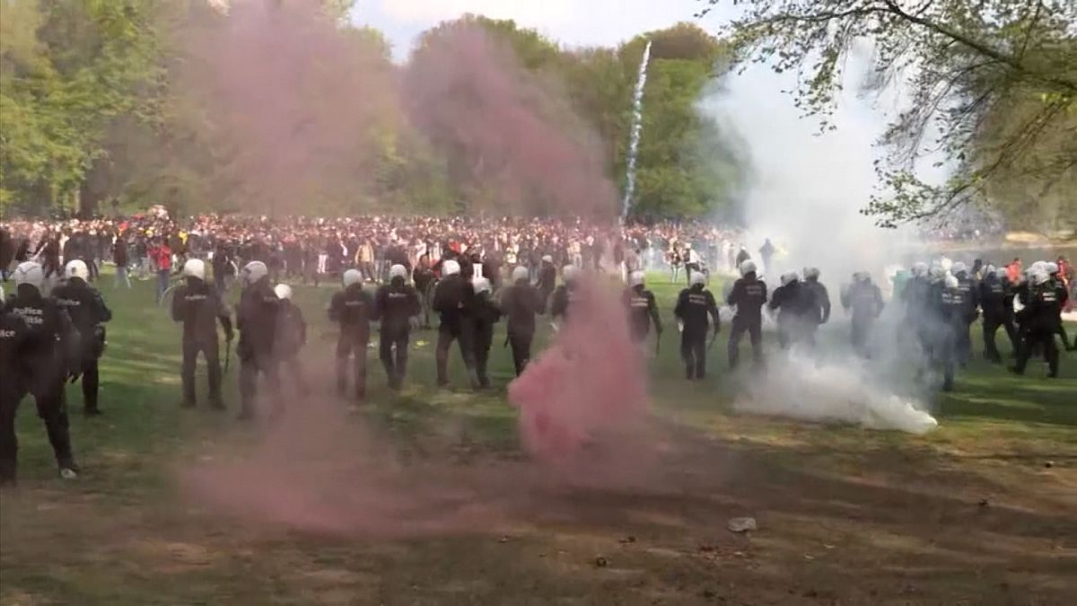 Police used tear gas and water cannon on Saturday to disperse revelers at an illegal party in Brussels' Bois de la Cambre park.