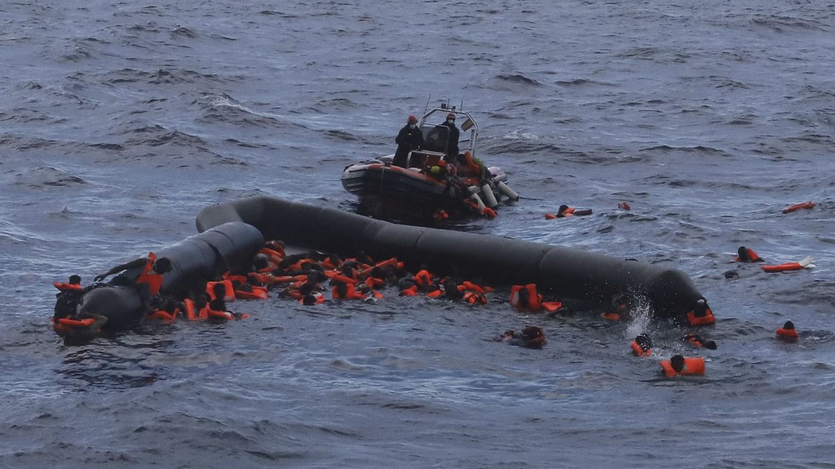  In this Wednesday, Nov. 11, 2020 file photo, refugees and migrants are rescued by members of the Spanish NGO Proactiva Open Arms, after leaving Libya trying to reach Europe.