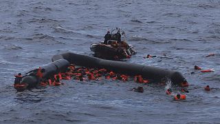  In this Wednesday, Nov. 11, 2020 file photo, refugees and migrants are rescued by members of the Spanish NGO Proactiva Open Arms, after leaving Libya trying to reach Europe.