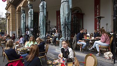 People toast as terraces reopened at midday in Utrecht, Netherlands, Wednesday, April 28, 2021. People toast as terraces reopened at midday in Utrecht, Netherlands, Wednesday, April 28, 2021.