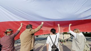 FILE: People demonstrate on the 20th anniversary of Poland’s constitution in front of the presidential palace in Warsaw, Poland, on Sunday, April 2, 2017. 