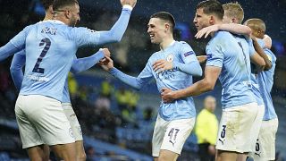 Manchester City's Riyad Mahrez celebrates with teammates after scoring his second goal in the Champions League semifinal match against PSG.