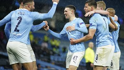 Manchester City's Riyad Mahrez celebrates with teammates after scoring his second goal in the Champions League semifinal match against PSG. Manchester City's Riyad Mahrez celebrates with teammates after scoring his second goal in the Champions League semifinal match against PSG.