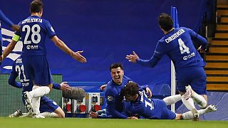 Chelsea's Mason Mount, centre, celebrates with his teammates after scoring his side's second goal,