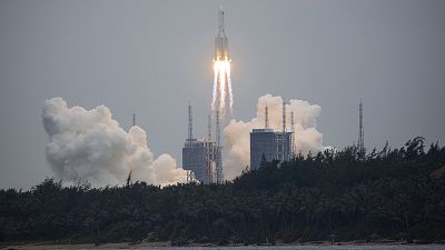 FILE: A Long March 5B rocket carrying a module for a Chinese space station lifts off from the Wenchang Spacecraft Launch Site in China, Thursday, April 29, 2021.
