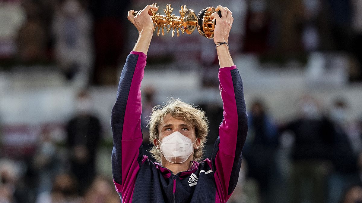 Germany's Alexander Zverev holds the trophy after winning the men's final match against Italy's Matteo Berrettini