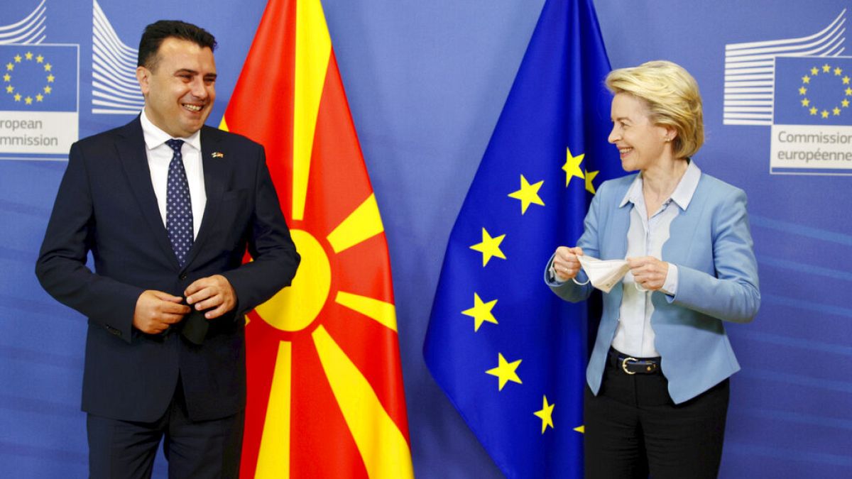 European Commission President Ursula von der Leyen and North Macedonia's Prime Minister Zoran Zaev pose for photographers at EU headquarters in Brussels