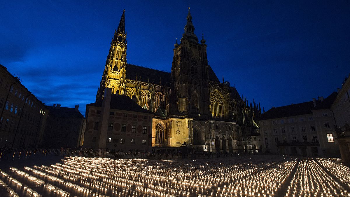 Candles are placed at the Prague Castle to commemorate victims of the COVID-19 pandemic.