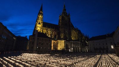 Candles are placed at the Prague Castle to commemorate victims of the COVID-19 pandemic.