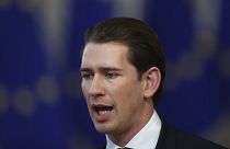 FILE: Austrian Chancellor Sebastian Kurz speaks with the media as he arrives for an EU summit in Brussels, Thursday, March 21, 2019.