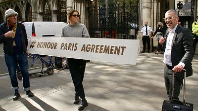 Activists say the UK's oil and gas regulations do not hold up their end of the Paris Agreement Activists say the UK's oil and gas regulations do not hold up their end of the Paris Agreement