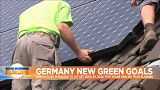 Solar panels being assembled on rooftop.