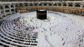 Muslim worshippers gather around the Kaaba, to mark the end of the fasting month of Ramadan.