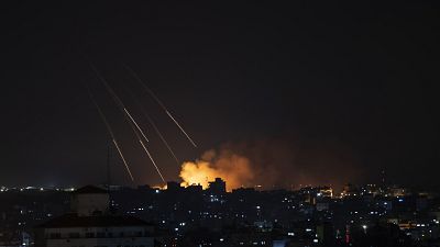 Smoke rises following Israeli missile strikes on Gaza City, Thursday, May 13, 2021.
