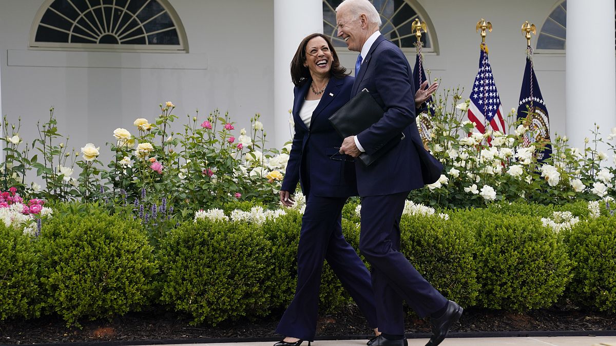 President Joe Biden walks with Vice President Kamala Harris at the White House on May 13, 2021.