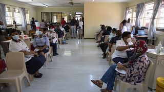 South African healthcare workers rush to beat deadline for Covid jab