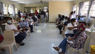 South African healthcare workers rush to beat deadline for Covid jab
