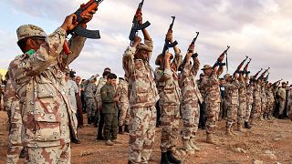 Libyans protest accusing militias of recruiting migrants