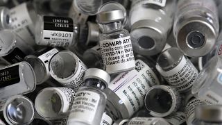 Empty vials of the Pfizer-BioNTech COVID-19 vaccine during a vaccine campaign at the Vaccine Village in Ebersberg near Munich, Germany, May 15, 2021.