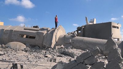 A man praying amid the rubble of the Qlebo mosque at the Jabalia refugee camp in the northern Gaza Strip.