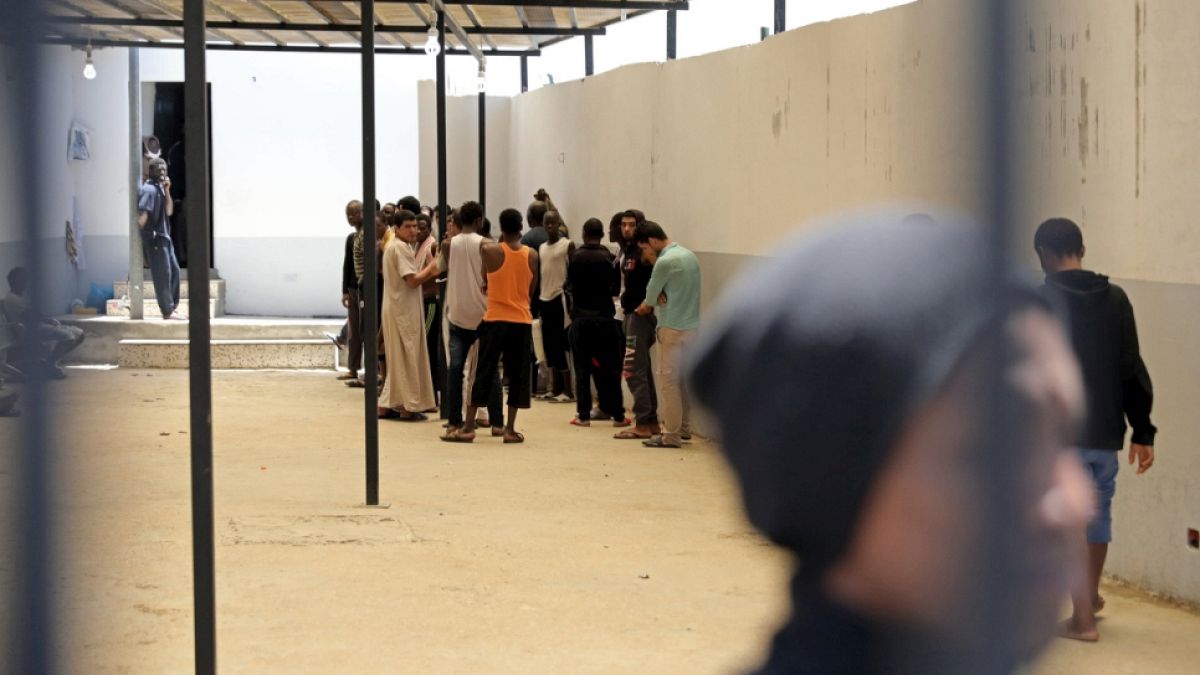 People gathered inside a Tripoli detention centre, pictured in May 2017
