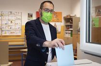 Zagreb Mayoral candidate Tomislav Tomasevic casts his ballot, at a polling station in Zagreb, Croatia, Sunday, May 16, 2021. 