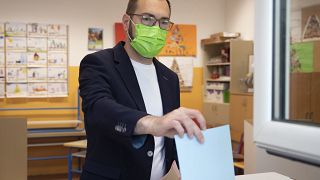 Zagreb Mayoral candidate Tomislav Tomasevic casts his ballot, at a polling station in Zagreb, Croatia, Sunday, May 16, 2021.