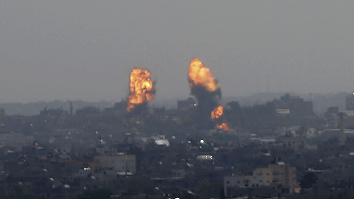 Flares rise after an Israeli forces strike in Gaza City
