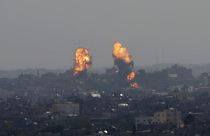 Flares rise after an Israeli forces strike in Gaza City