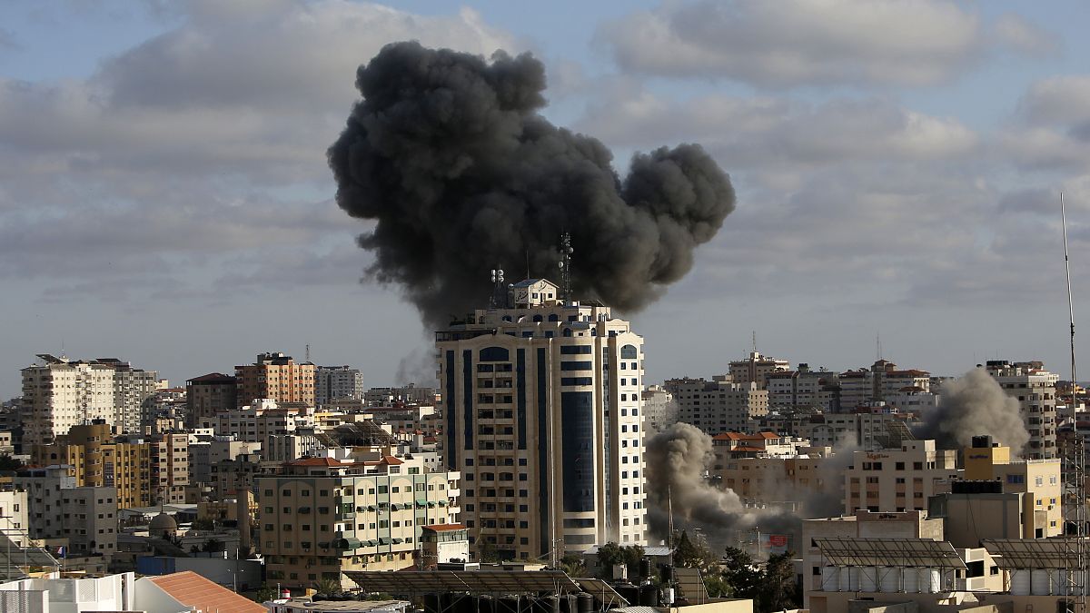 An Israeli air strike hits a building in Gaza City, Monday, May 17